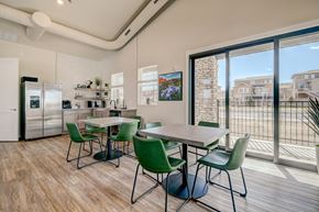 Castle Rock townhouse for rent - A kitchen with a dining table and chairs.