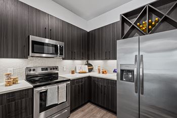Designer tile backsplash in kitchen