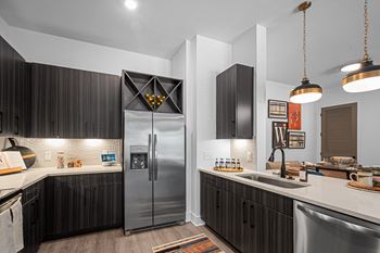 Shaker panel cabinetry with wine rack