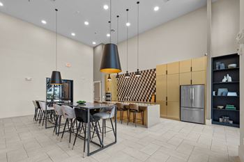 Indoor & outdoor kitchens with lounging areas