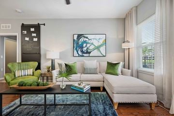 Kissimmee apartment for rent - a living room with a couch and a coffee table