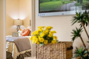 Daytona Beach apartment for rent - A beautiful vase of yellow flowers on a table