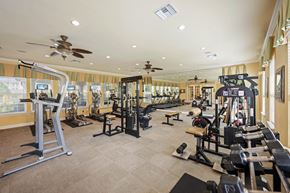 Daytona Beach apartment for rent - A fitness center with various fitness equipment