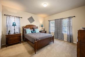 Savannah apartment for rent - A bedroom with a bed, dresser, and nightstand.
