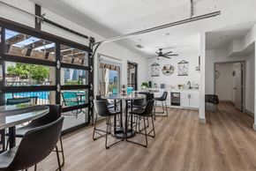 Albuquerque apartment for rent - A dining area with a table and chairs is shown.