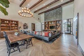 Richmond apartment for rent - A modern dining room with a wooden table and chairs.