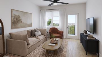 Denton apartment for rent - A living room with a brown couch, a coffee table, a television, and a painting on the wall.