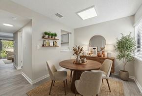 Hillsborough townhouse for rent - A dining room with a round table and chairs.