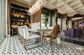 Las Vegas apartment for rent - a dining room with a white table and chairs