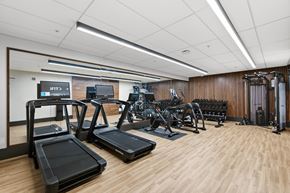 Jackson apartment for rent - A gym with treadmills, elliptical machines, and other exercise equipment.