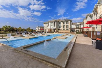 Shimmering swimming pool with private cabanas