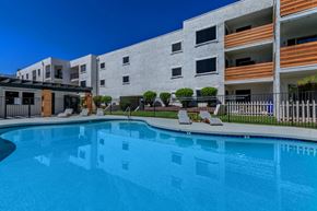 Glendale apartment for rent - a large swimming pool in front of an apartment building