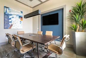 Katy apartment for rent - a conference room with a table and chairs