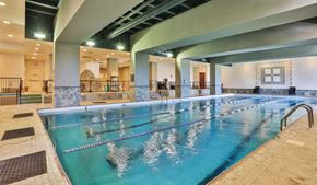 Minneapolis apartment for rent - Swimmers in a large indoor pool.