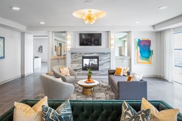 Houston apartment for rent - a living room with couches and chairs and a fireplace