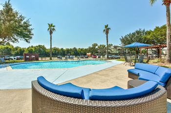 Sparkling pool with nearby pergola