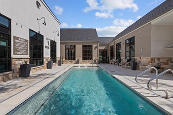 Resort-style pool with sundeck