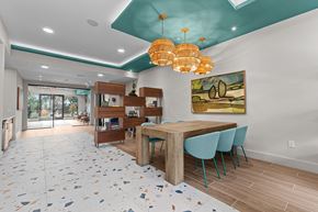 Austin apartment for rent - A dining room with a table and chairs.