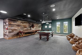 Game room with shuffleboard & billiards