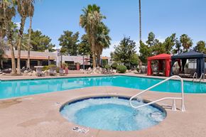 Tucson apartment for rent - A small round pool with a white ladder.