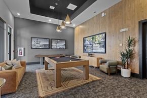 El Paso apartment for rent - A room with a pool table and a couch.