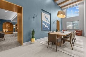 Austin townhouse for rent - A modern dining room with a wooden table and chairs.