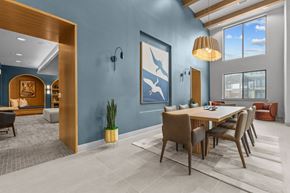 Austin townhouse for rent - A modern dining room with a wooden table and chairs.