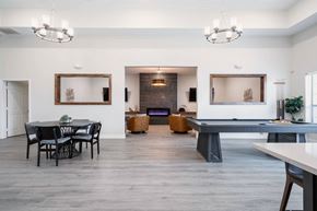 Killeen apartment for rent - a game room with a ping pong table and chairs