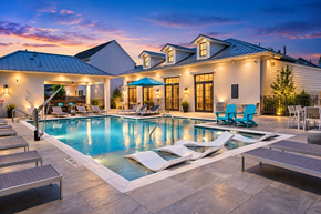 Richmond apartment for rent - A large house with a pool in the backyard.