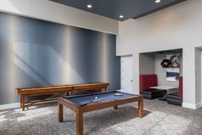 Houston apartment for rent - a game room with a pool table and a ping pong