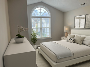 Raleigh apartment for rent - a bedroom with a bed and a dresser and a window