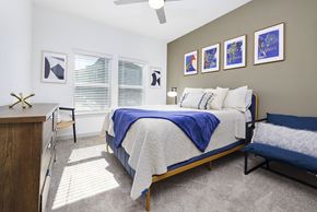 Stockbridge apartment for rent - a bedroom with a bed and a desk