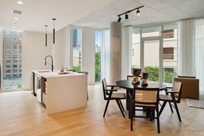 San Antonio apartment for rent - A modern kitchen with a dining table and chairs.