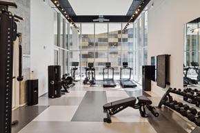 San Antonio apartment for rent - A gym with a variety of equipment including weights and treadmills.