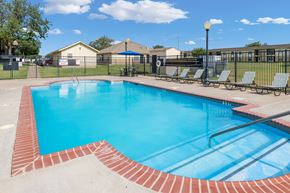 Amarillo apartment for rent - A small pool with a red brick border.