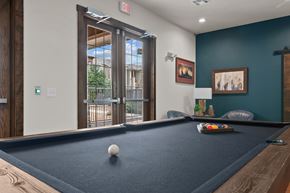 College Station apartment for rent - A pool table with a white ball on it.