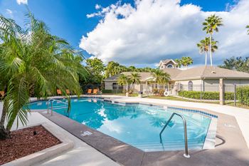 Two resort-style pools with seating