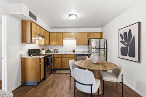Yuma apartment for rent - A kitchen with a table and chairs.