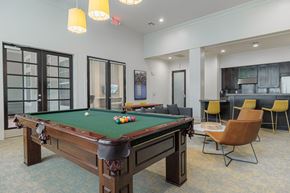 Stafford apartment for rent - a community room with a pool table and chairs
