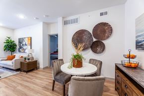 Grand Prairie apartment for rent - A dining room with a white table and chairs.