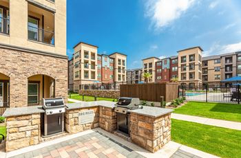 Poolside kitchen, cabanas and fire pit and lounge deck
