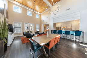Pasadena apartment for rent - A modern dining room with a wooden table and chairs.