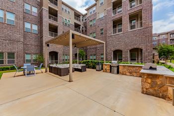 Two courtyards with bbq grills