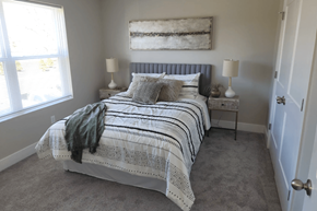 South Lyon apartment for rent - a bedroom with a bed and a window