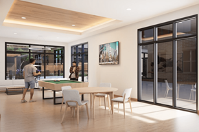 Omaha apartment for rent - A man is playing pool in a room with a pool table.