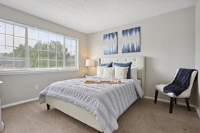 Marietta apartment for rent - a bedroom with a bed and a chair
