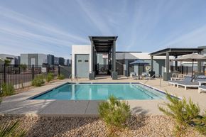 Surprise townhouse for rent - A modern house with a pool in the backyard.