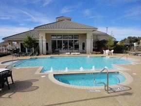 Temple apartment for rent - a swimming pool with a building in the background