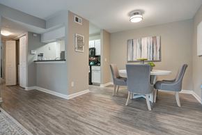 Jacksonville apartment for rent - A dining room with a table and chairs.