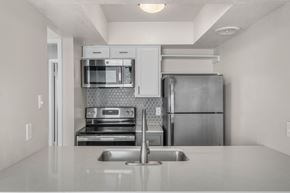 Mesa apartment for rent - a kitchen with stainless steel appliances and a sink